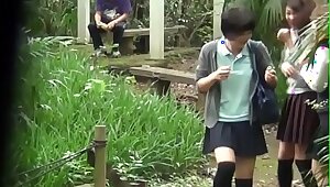 Teen asians pee outdoors and get spied on